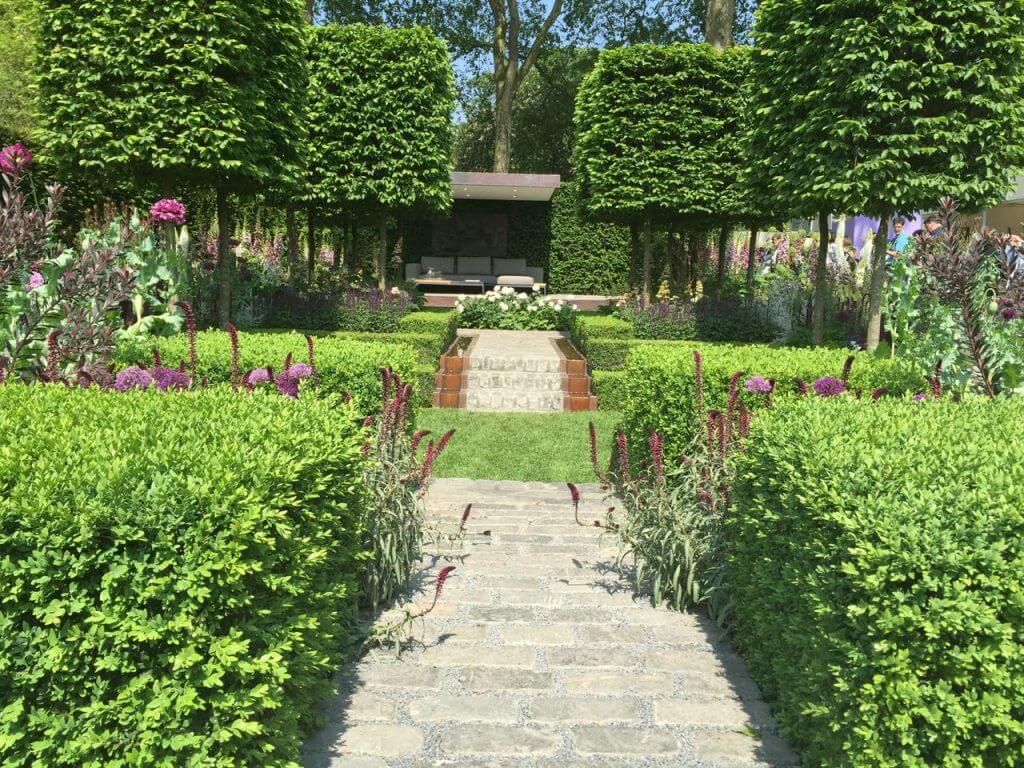 Adult formal garden with seated area, super high maintenance though