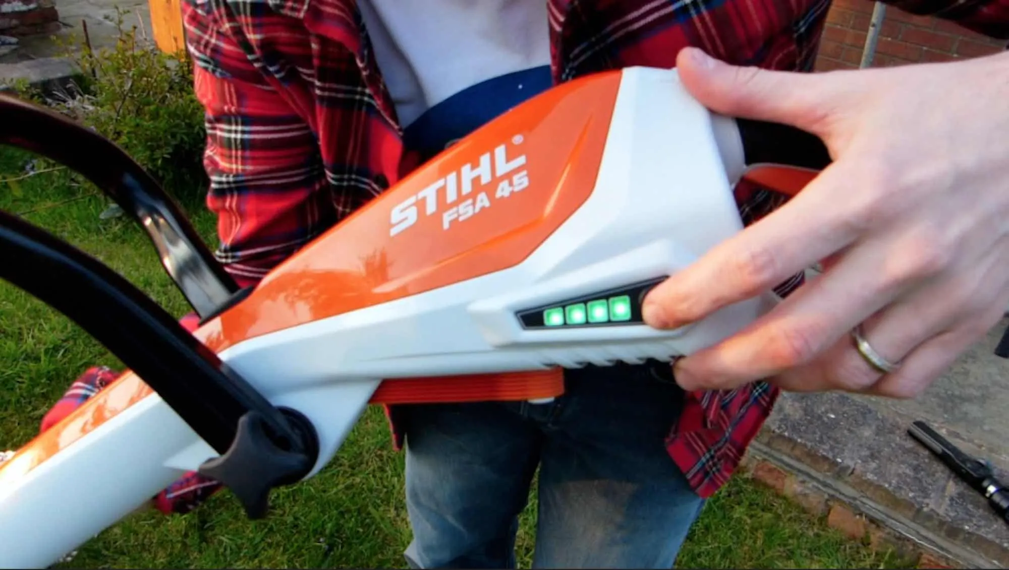 The battery charging lights on a stihl strimmer