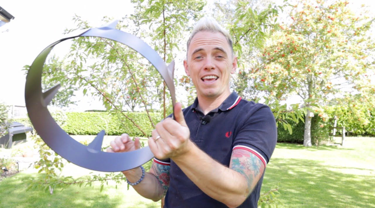 Lee Burkhill holding a tree ring