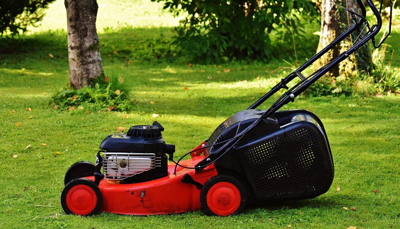 A red petrol powered lawn mower