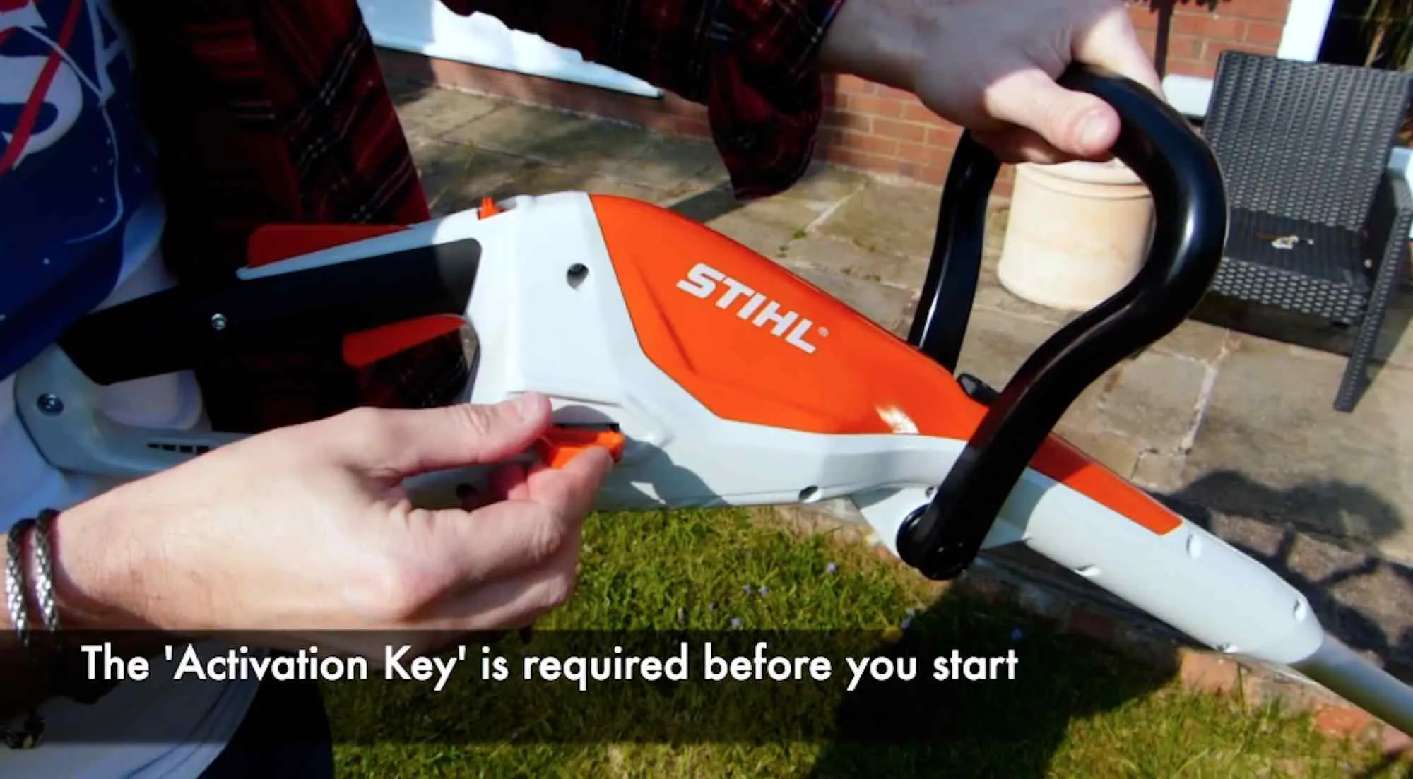 Activating a stihl strimmer with a safety key