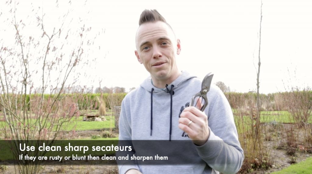 Lee Burkhill holding secateurs