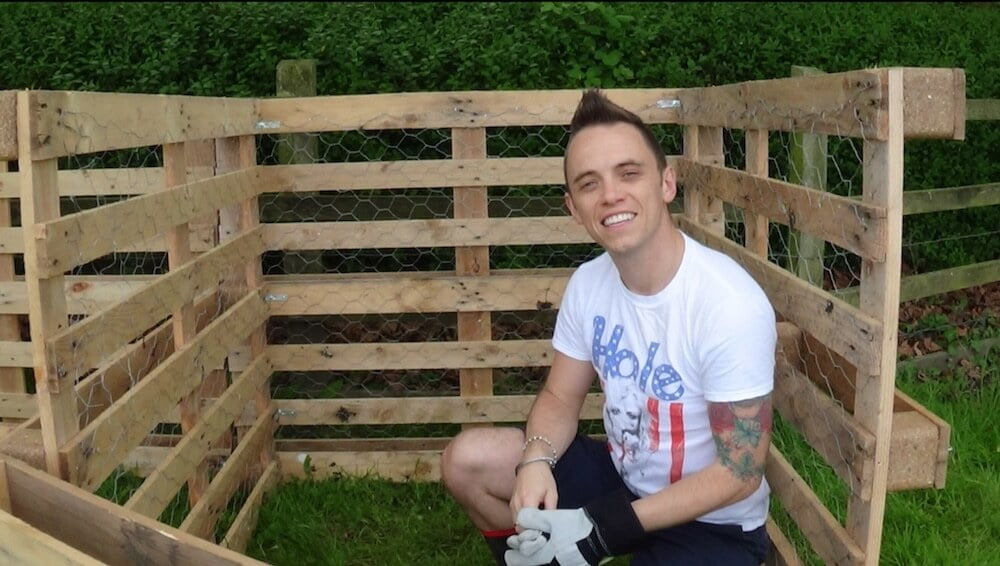 Garden Ninja smiling in a compost bin