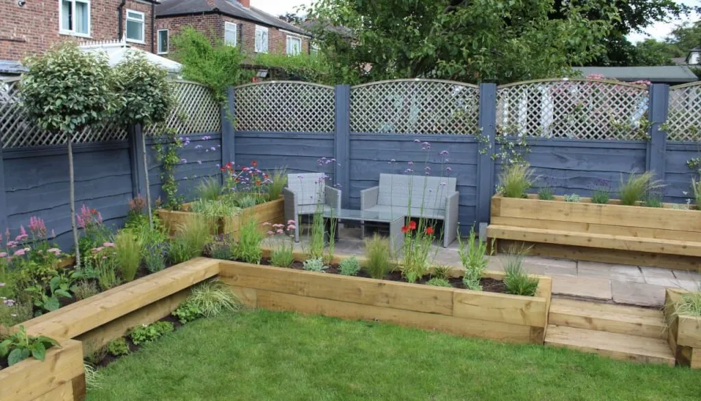 A newly planted family garden makeover with herbaceous borders and lawn zones