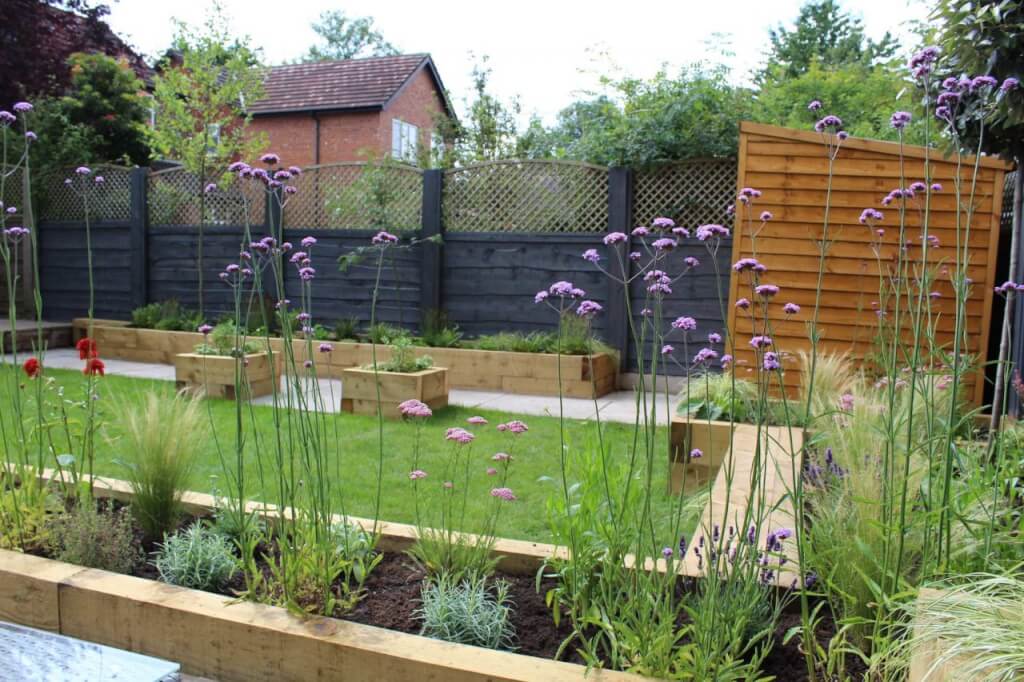 A modern family garden with verbena and pathways