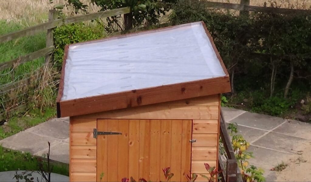 A shed with a waterproof roof