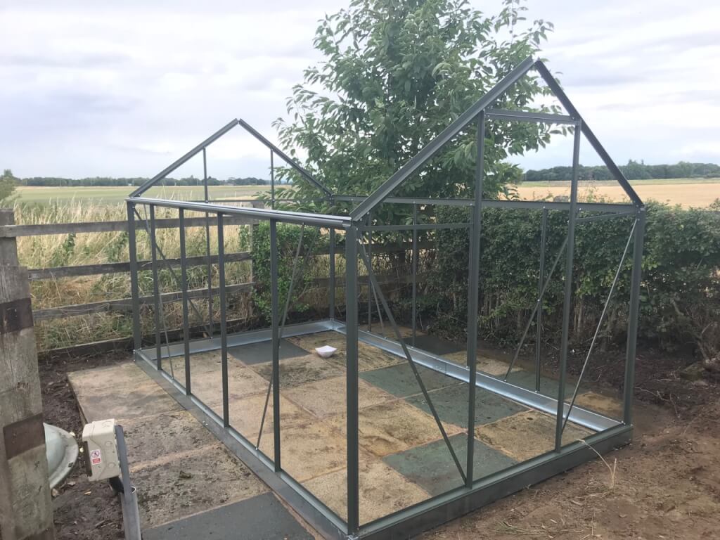 putting up a greenhouse