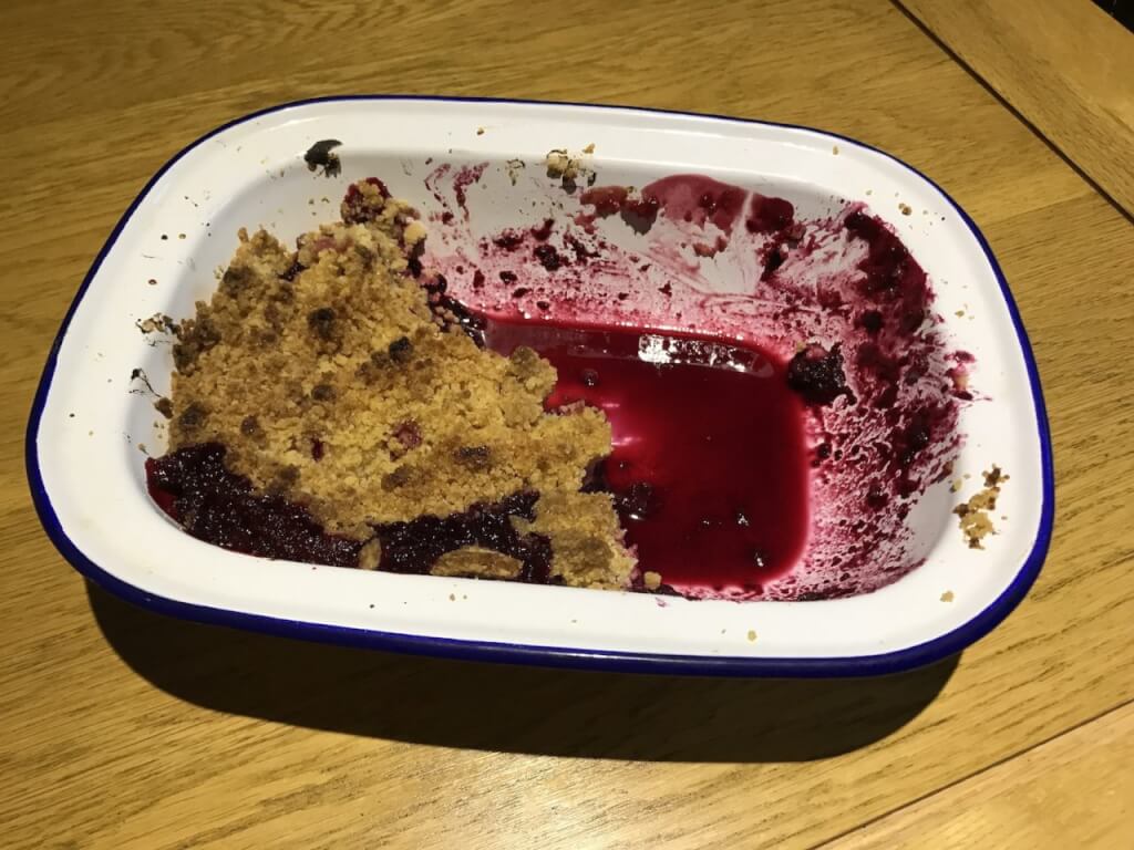 A half eaten Damson crumble