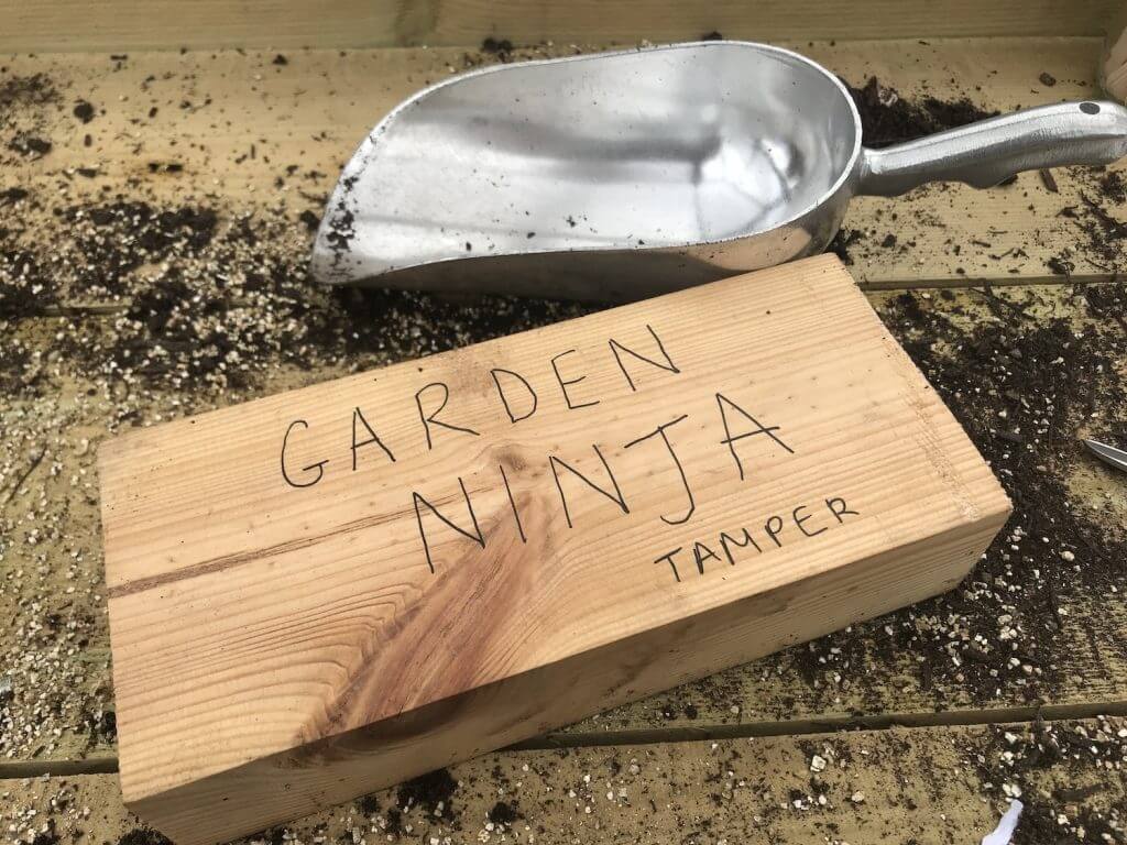 Garden Ninjas woods tamper for seed sowing
