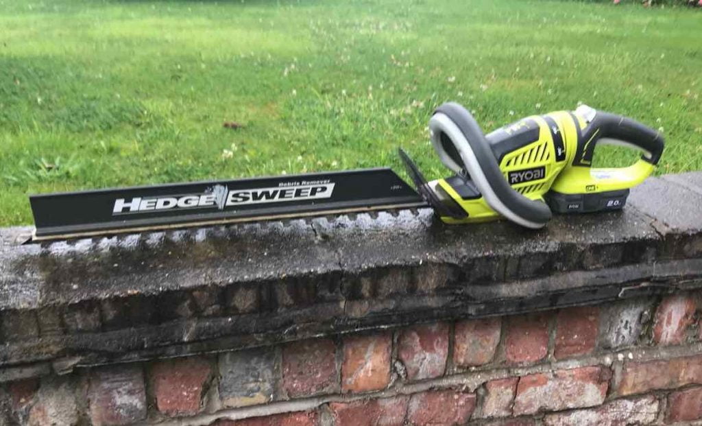 Ryobi hedge clippers on a wall