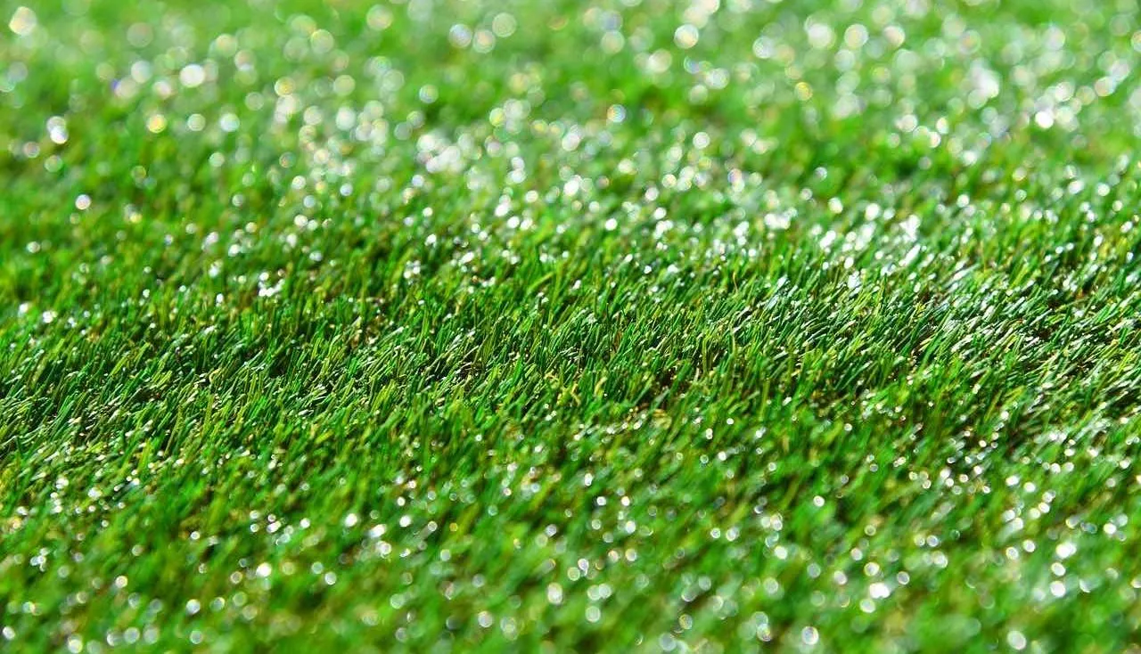 Fake artificial grass shining in light