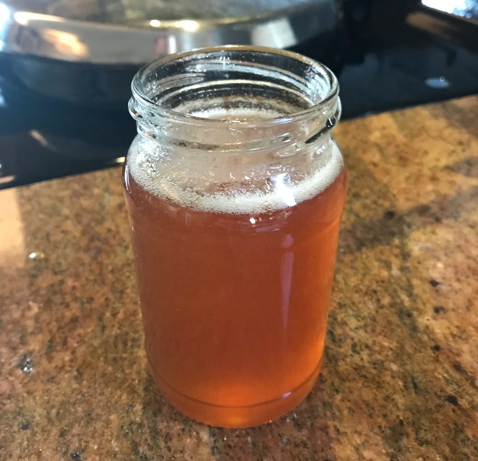 A jam jar full of medlar jelly