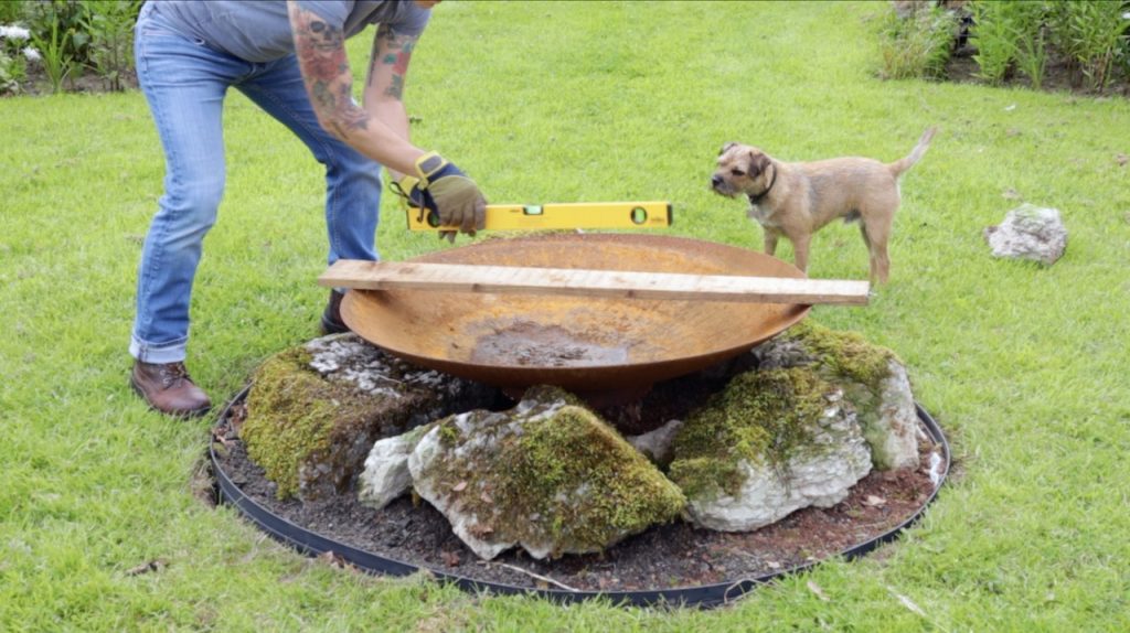 Checking a fire pit is level