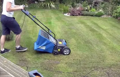 Scarifying a lawn with a powered scarifier