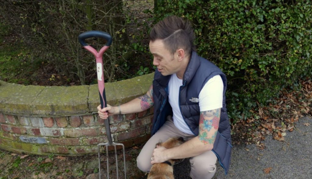 Lee Burkhill holding a garden fork