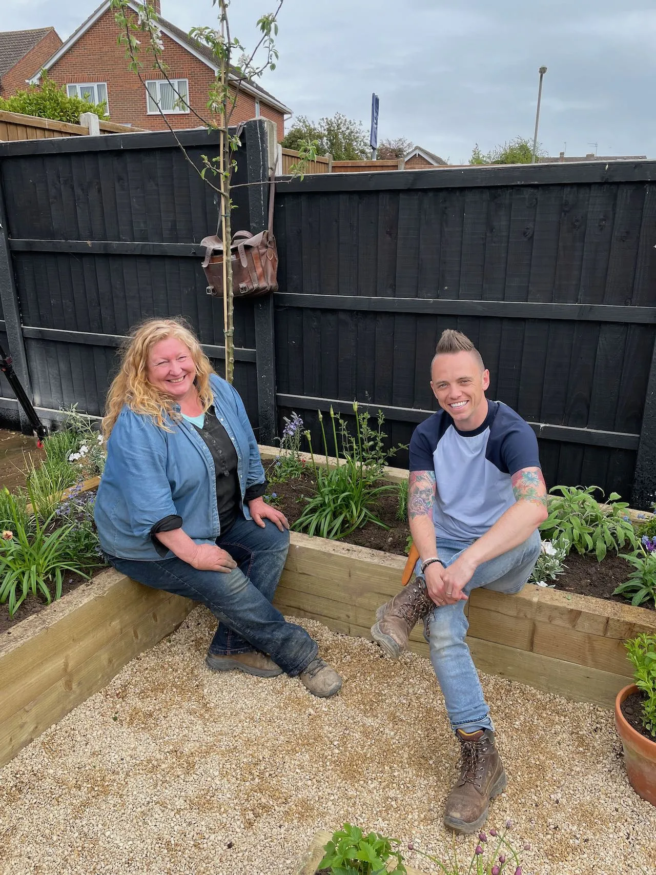 Lee Burkhill and Charlie Dimmock at a Garden Rescue reveal
