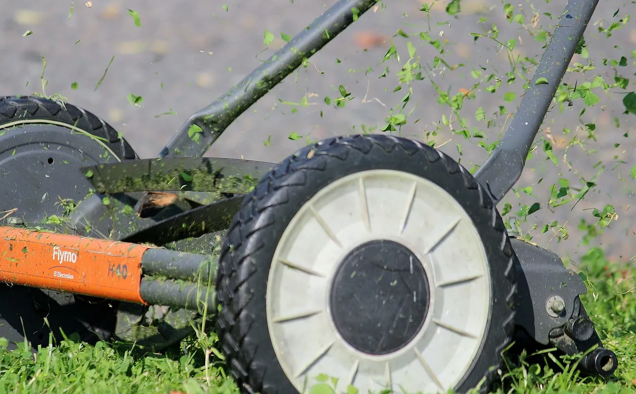 A manual rotary push mower suitable for small flat lawns