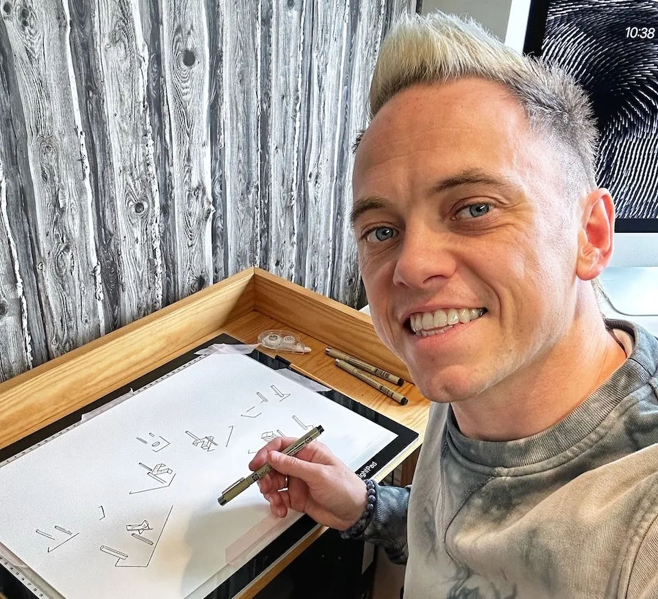 Lee Burkhill in his design studio