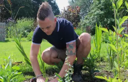 Garden ninja Lee Burkhill planting a border with seedlings
