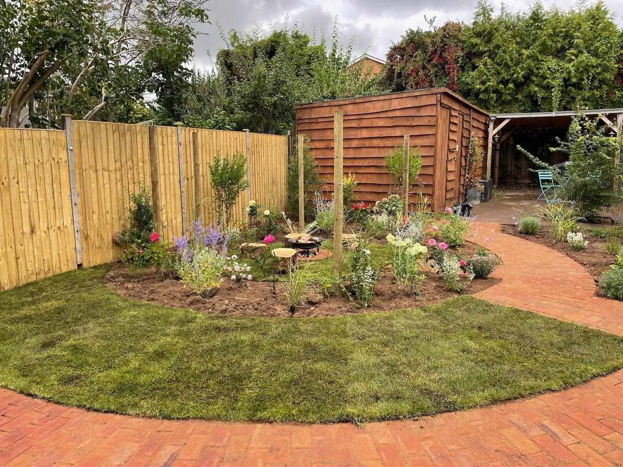 Brick block paving in a garden design by Garden Ninja Lee Burkhill, showing the warm tonal quality of reclaimed brick that suits townhouse and terraced gardens