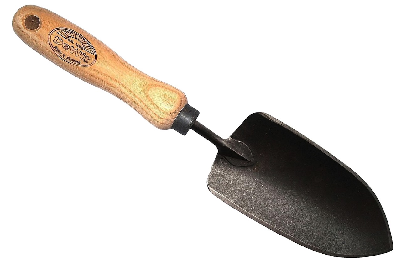 A DeWit forged hand trowel with an ash handle