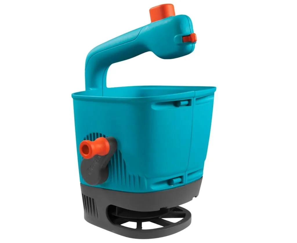 A hand held lawn spreader