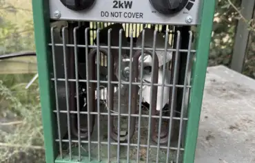 Lee Burkhill's LightHouse 2kW greenhouse heater with a MIN to MAX thermostat dial