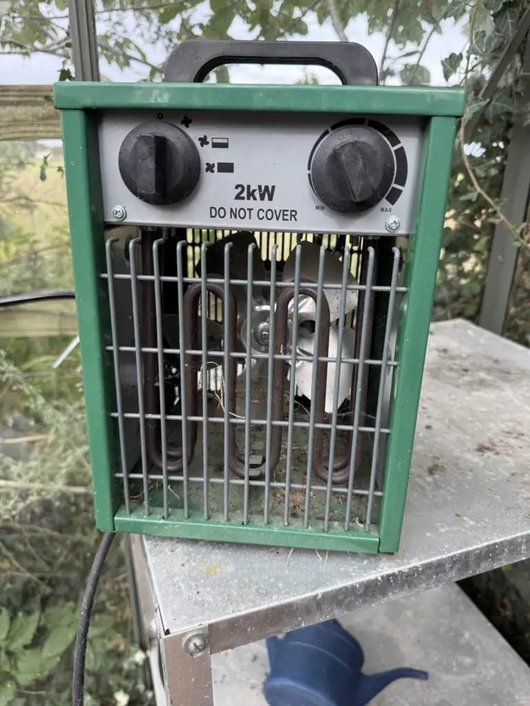 Lee Burkhill's LightHouse 2kW greenhouse heater with a MIN to MAX thermostat dial